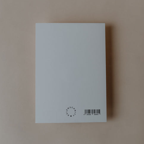 Rückseite einer Postkarte mit Eulenschnitt-Logo und Barcode auf hellem Hintergrund.