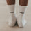 Kids Socken Großer Bruder in Weiß mit schwarzem Schriftzug „GROSSER BRUDER“