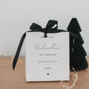 Geschenktüte Weihnachten mit Schriftzug und schwarzem Band dekoriert