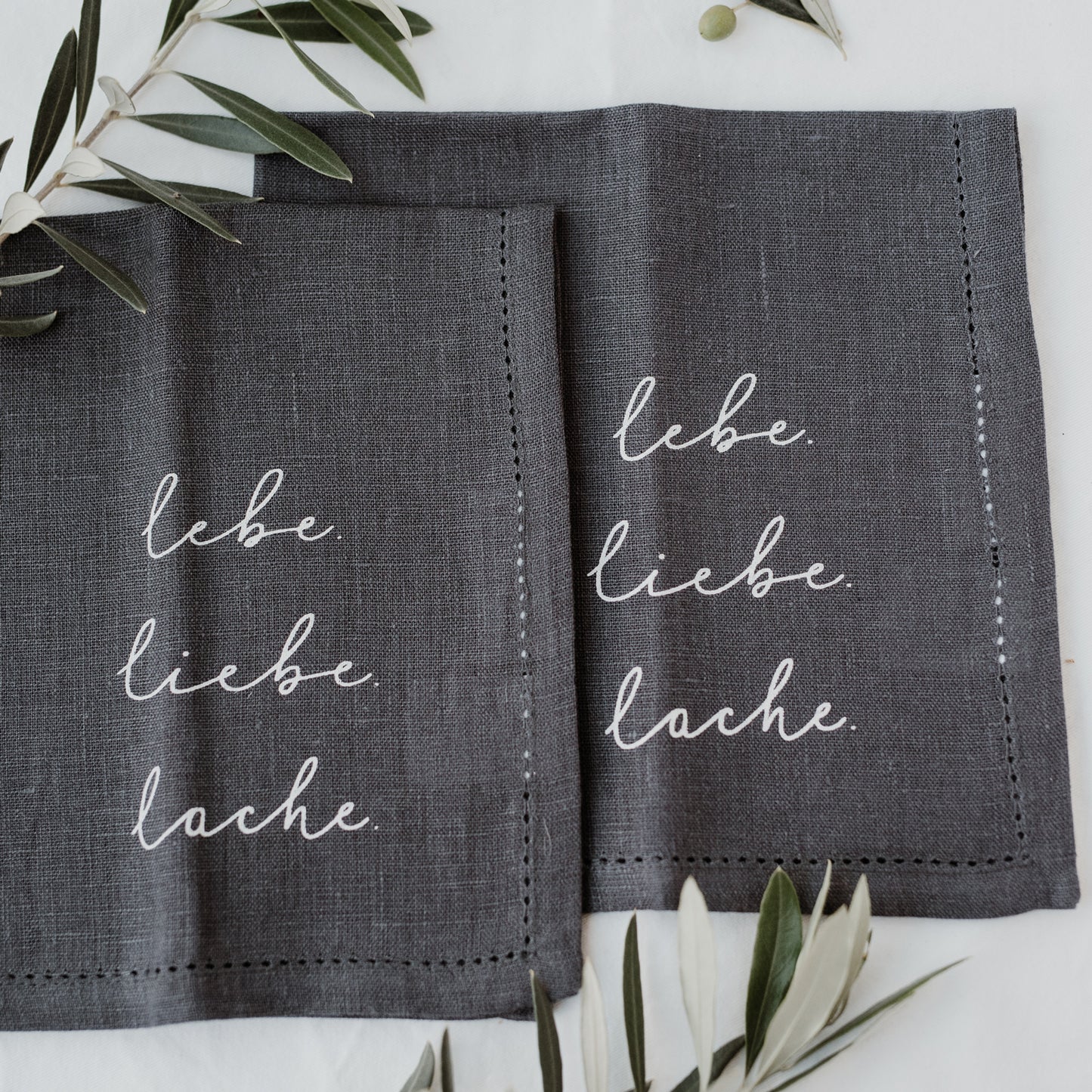 Serviettes en lin Liebe Lebe Lache en lot de 4